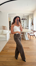 Jeans à boutons doré