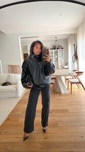 Veste à col noir